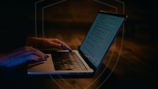 hands on a laptop looking at home office protection and security offers